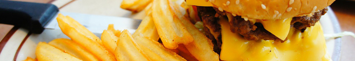 Eating Burger at Dena Burgers restaurant in Pasadena, CA.